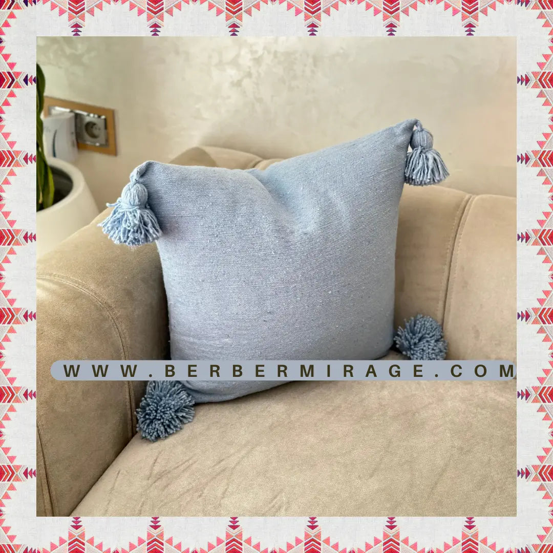 housse de coussin berbère en laine gris avec pompons 